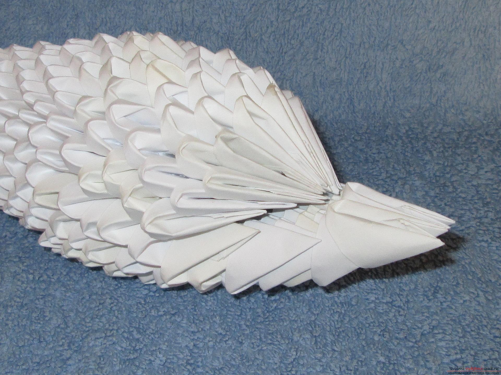 Если вы любите собирать модульное оригами, этот мастер-класс по созданию дельфина из бумаги для вас.. Фото №21